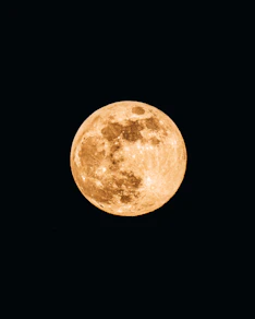 full moon in dark night sky