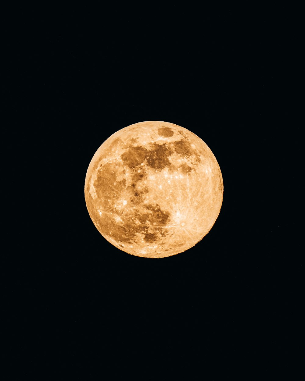 full moon in dark night sky