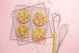 assorted color of candies on white tray