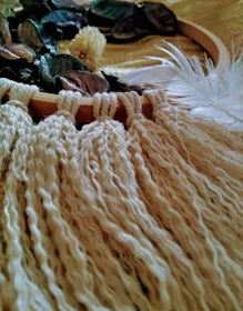 A vibrant photo of a handmade craft project featuring natural textures and warm lighting.