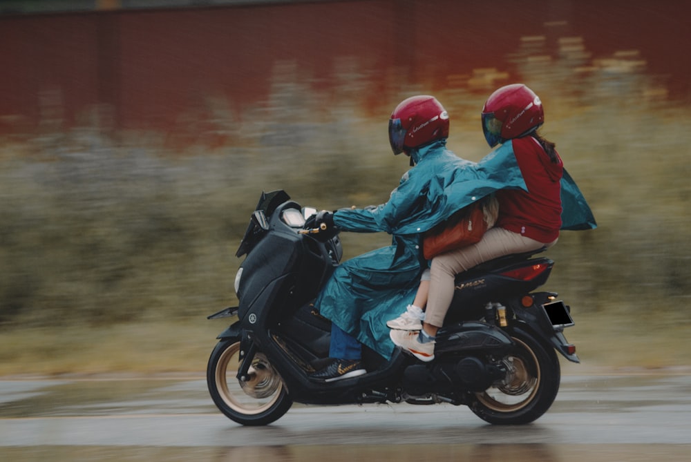 2 men riding on motorcycle