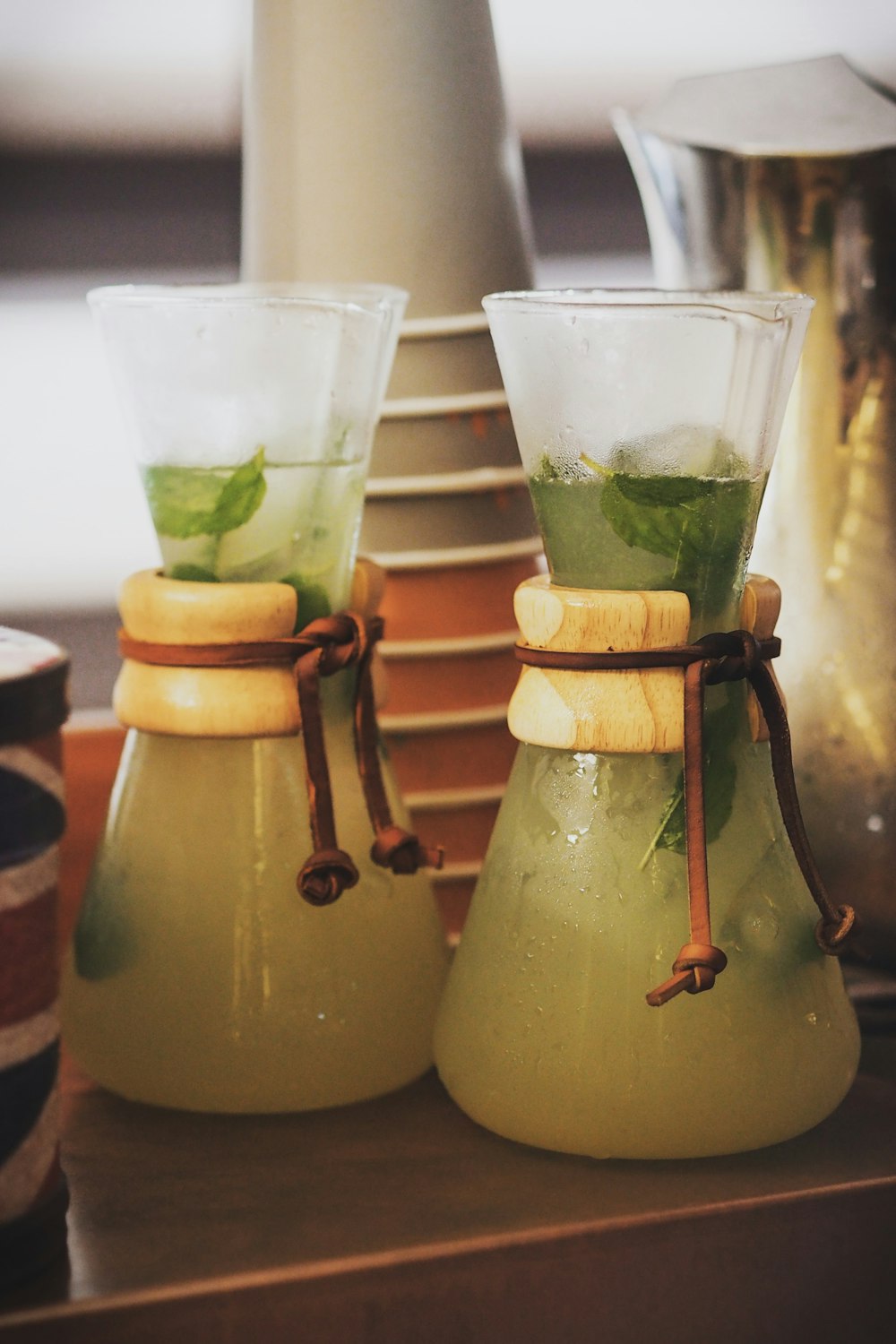 yellow liquid in clear glass pitcher