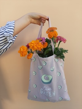 person holding bouquet of flowers