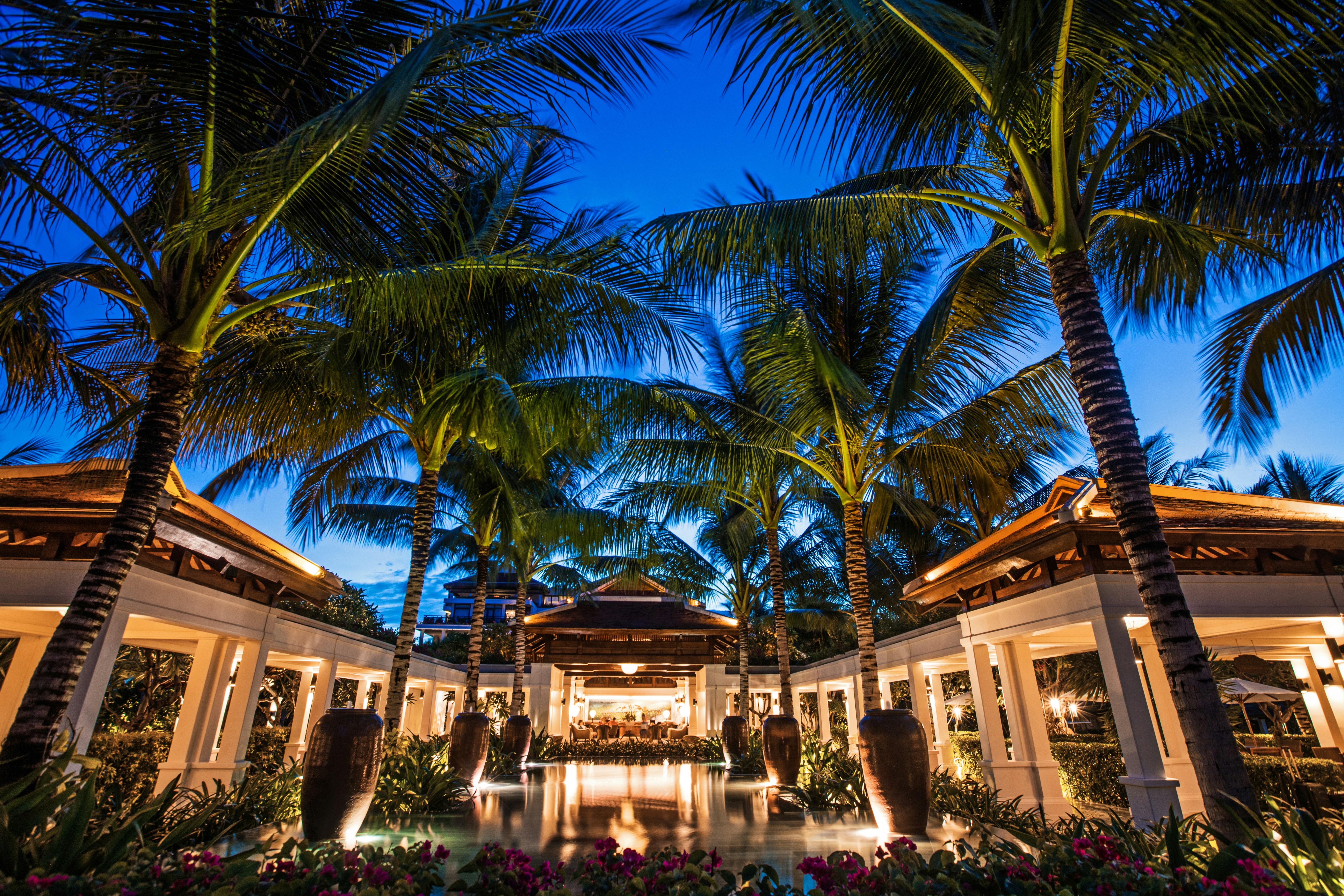 Indochine style resort with coconut trees, The Anam Cam Ranh, Vietnam