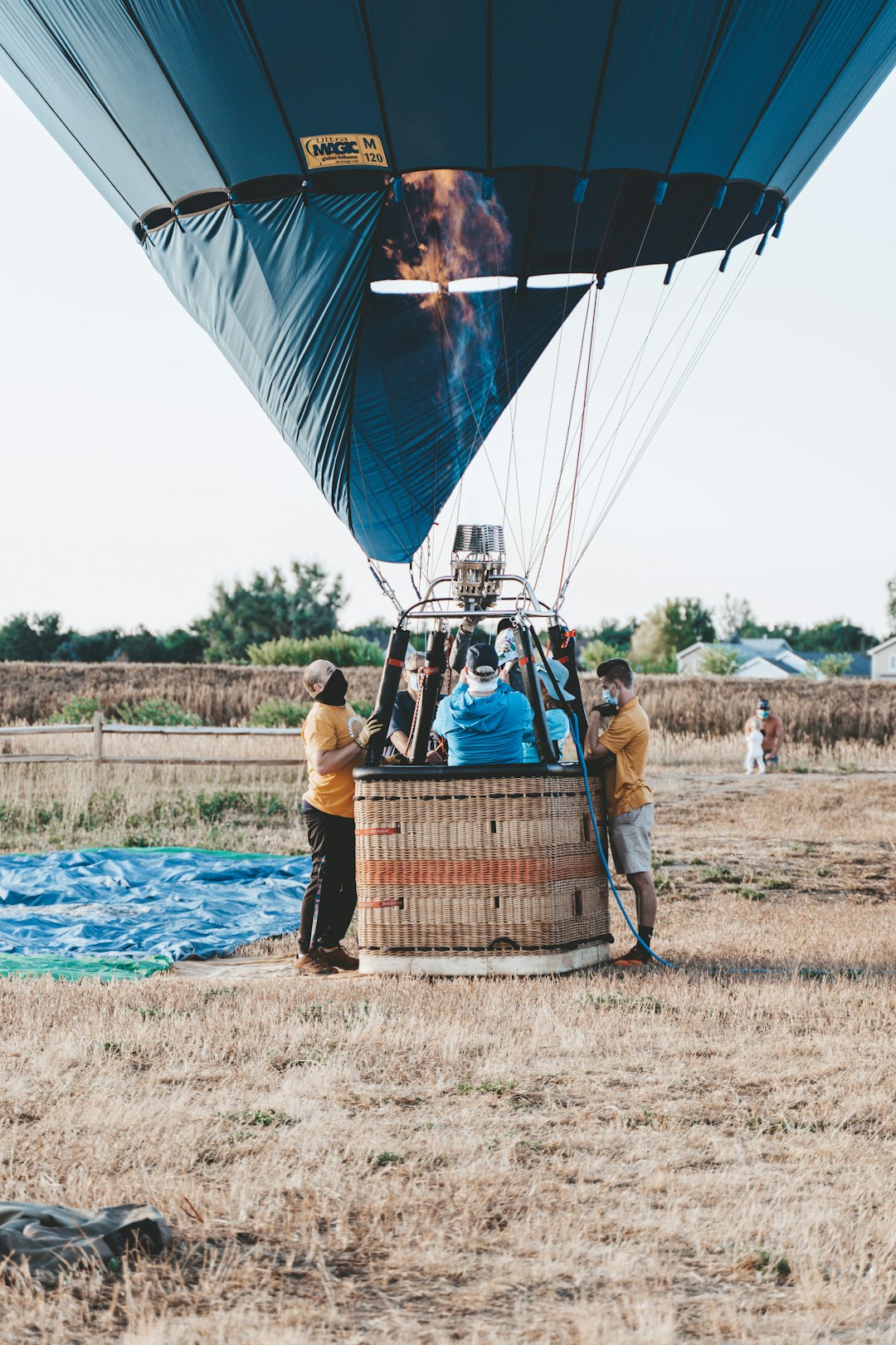 people in blue and brown hot air balloon during daytime