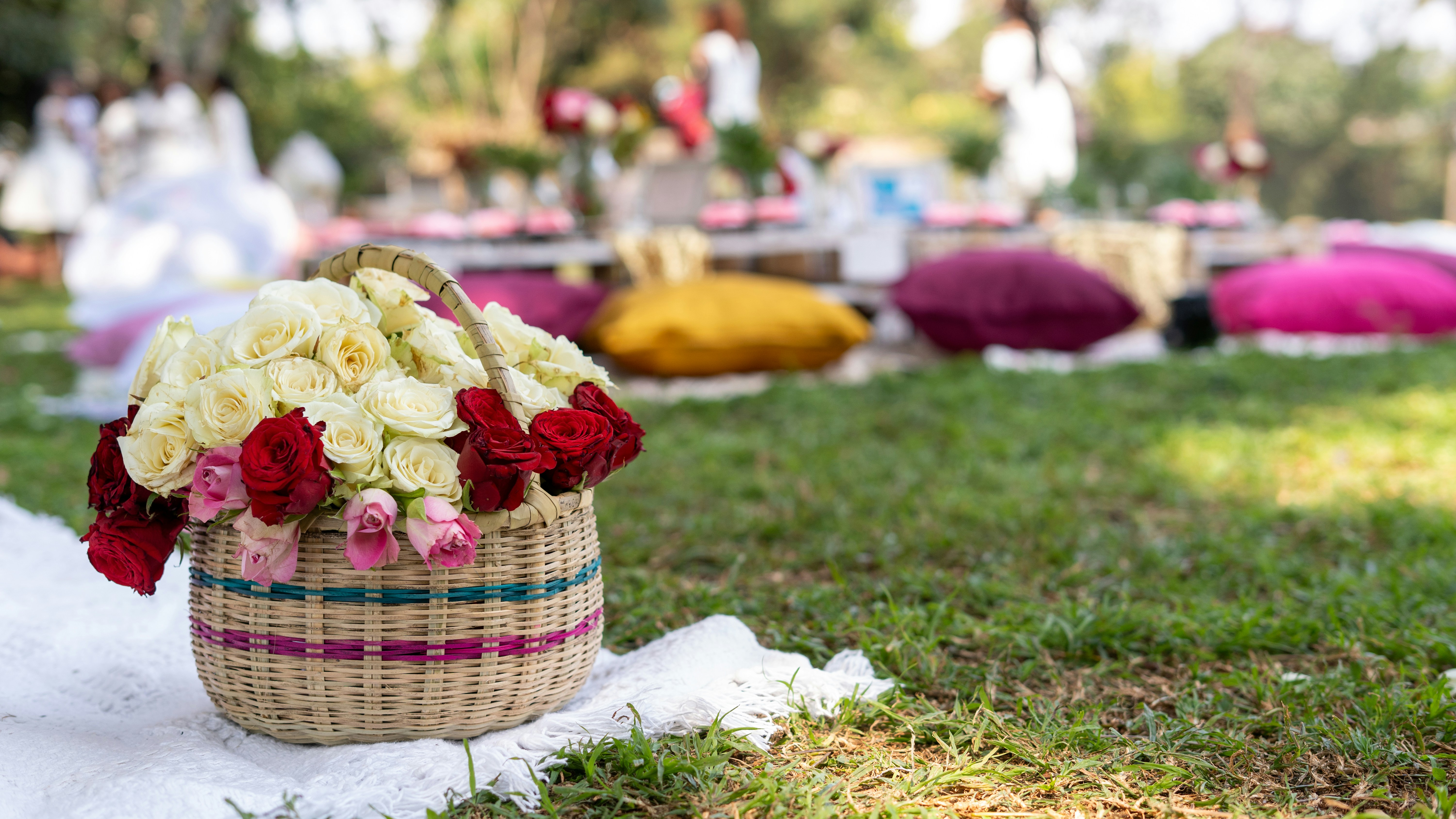 yellow and pink flower bouquet on white textile