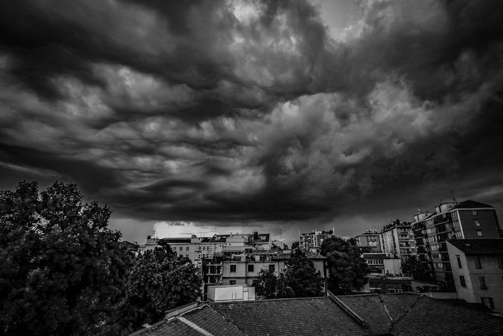 grayscale photo of city buildings