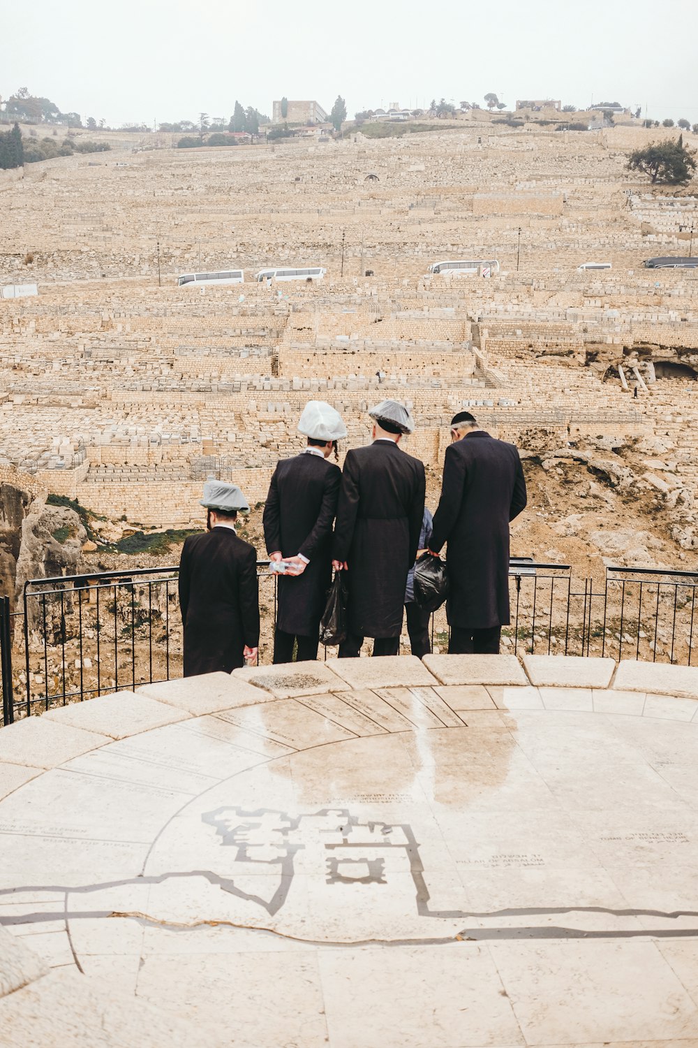 people standing on brown field during daytime