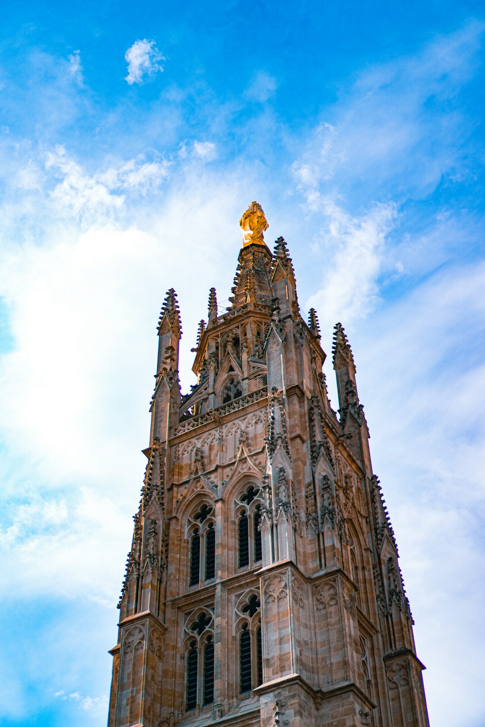 brown concrete church under blue sky during daytime