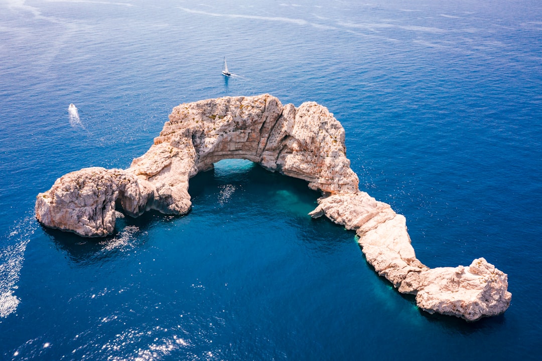 Natural arch photo spot Ibiza Spain