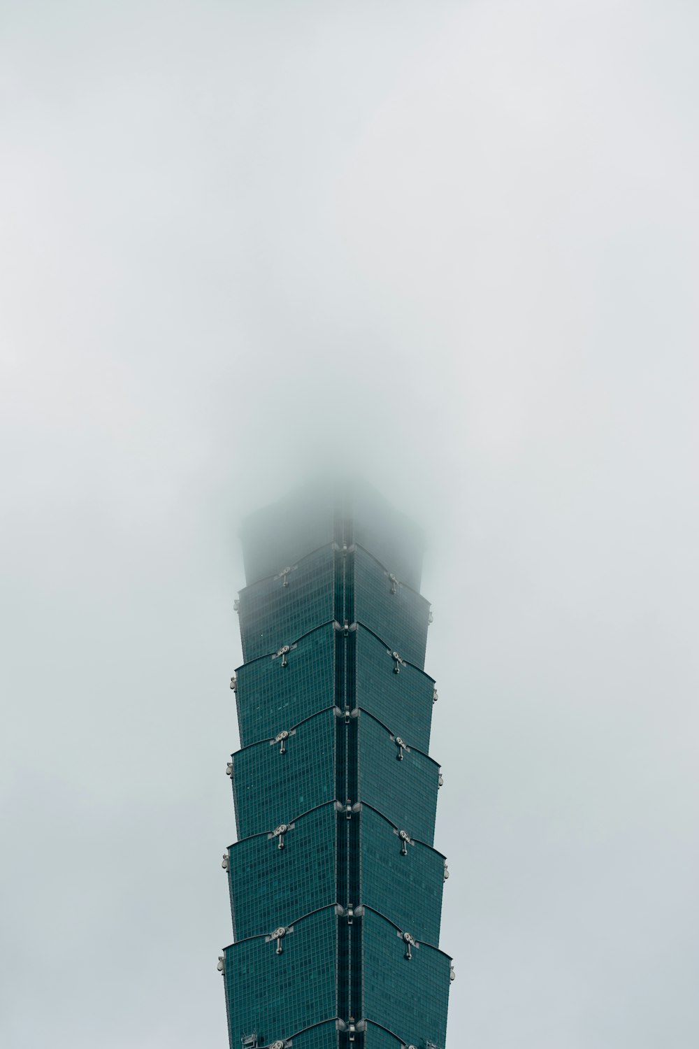 black concrete building under white sky during daytime