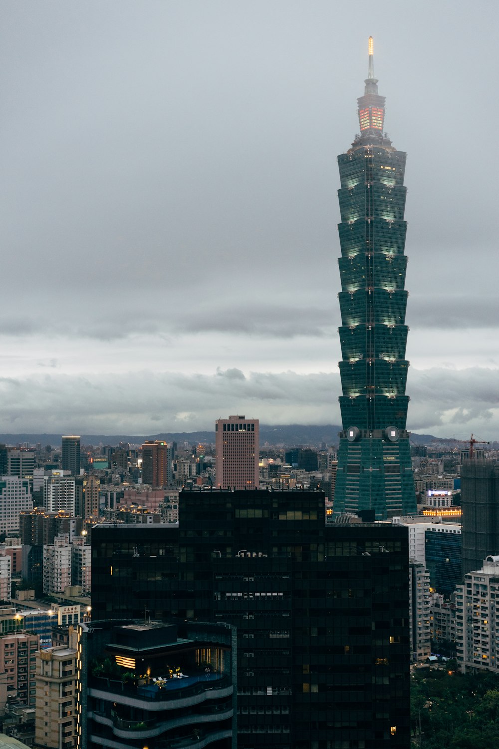 high rise buildings under gray sky