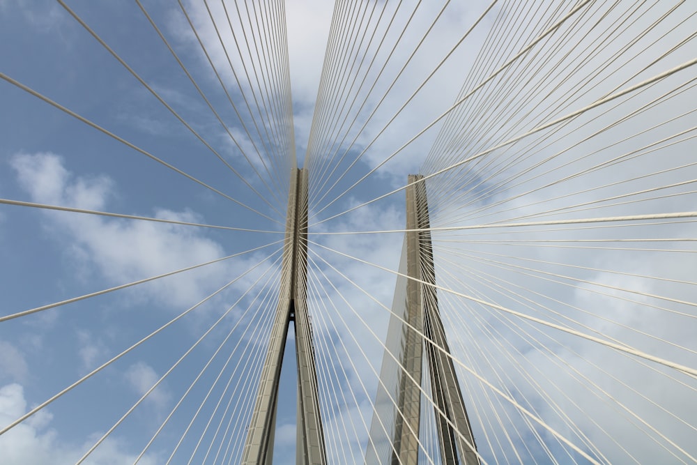 white and black cable wire under blue sky during daytime