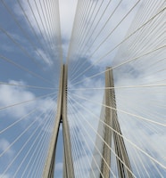 white and black cable wire under blue sky during daytime