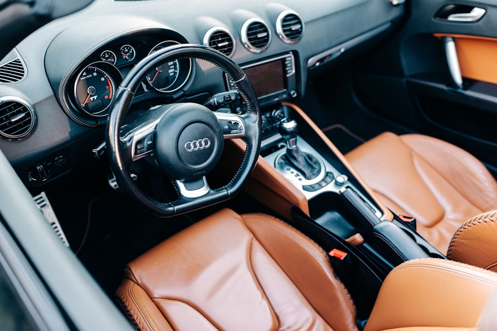 black and brown car steering wheel