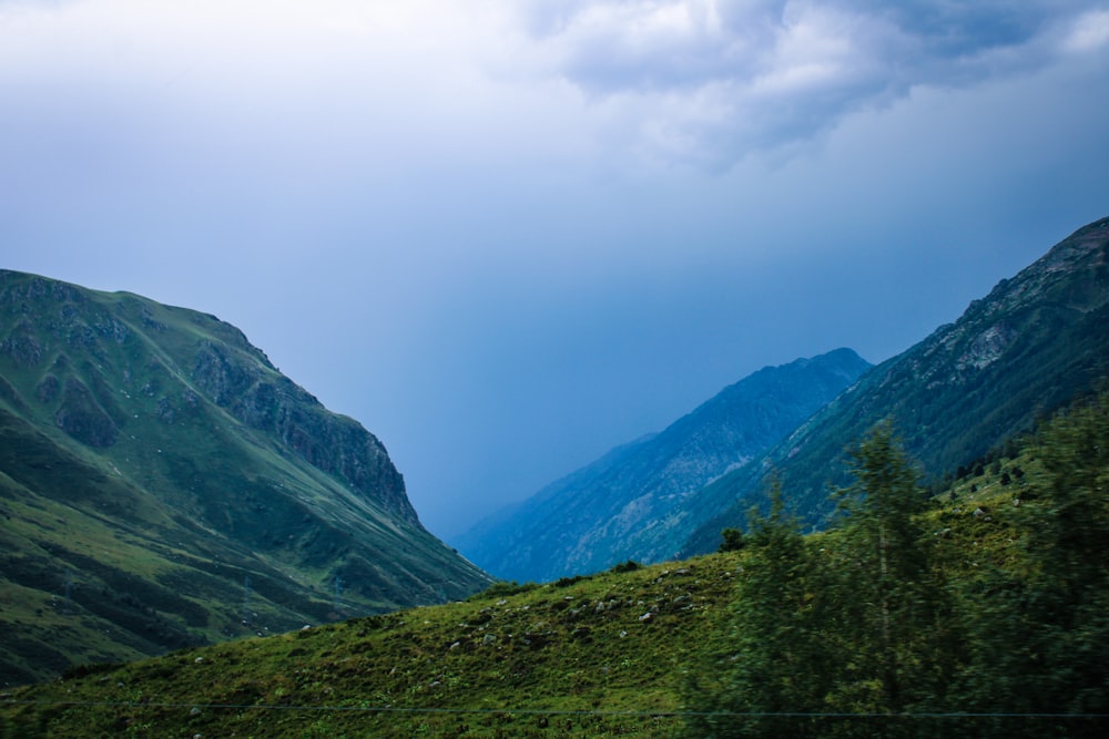 green mountains under white sky during daytime