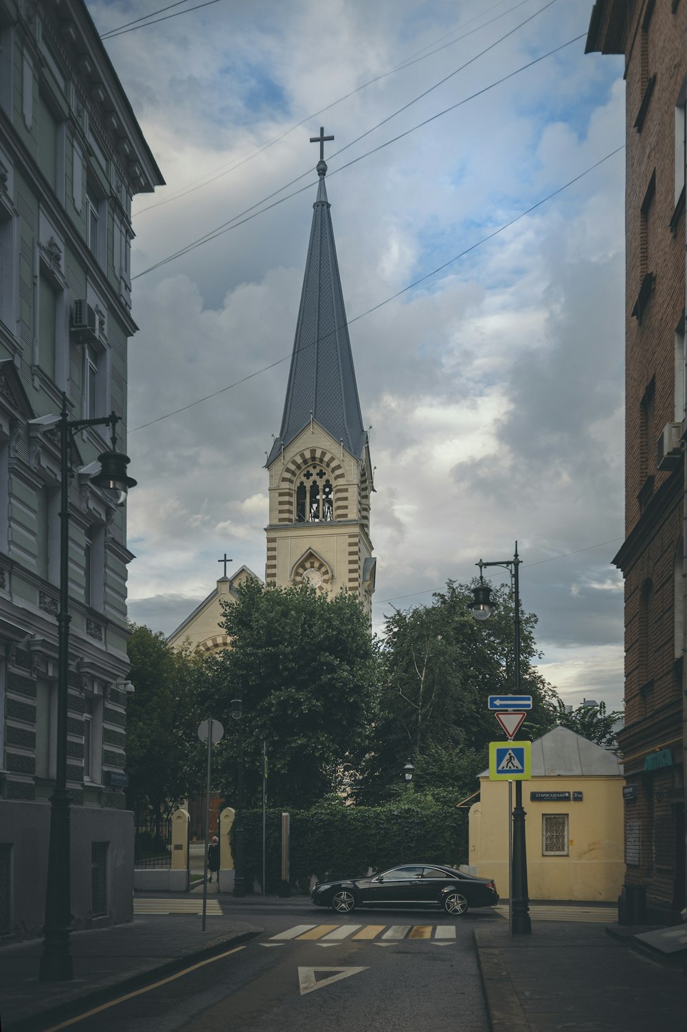 yellow and black street sign