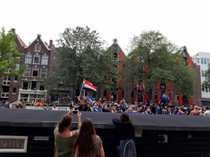 A lively promotional event with banners and engaged participants.