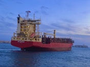 red and white ship on sea during daytime