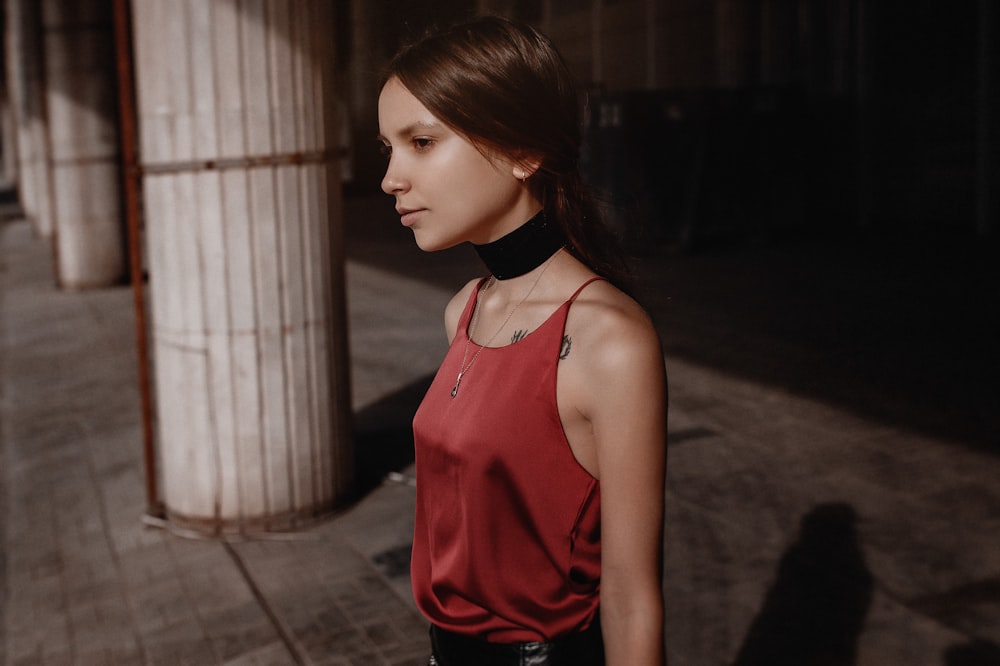 woman in red sleeveless top