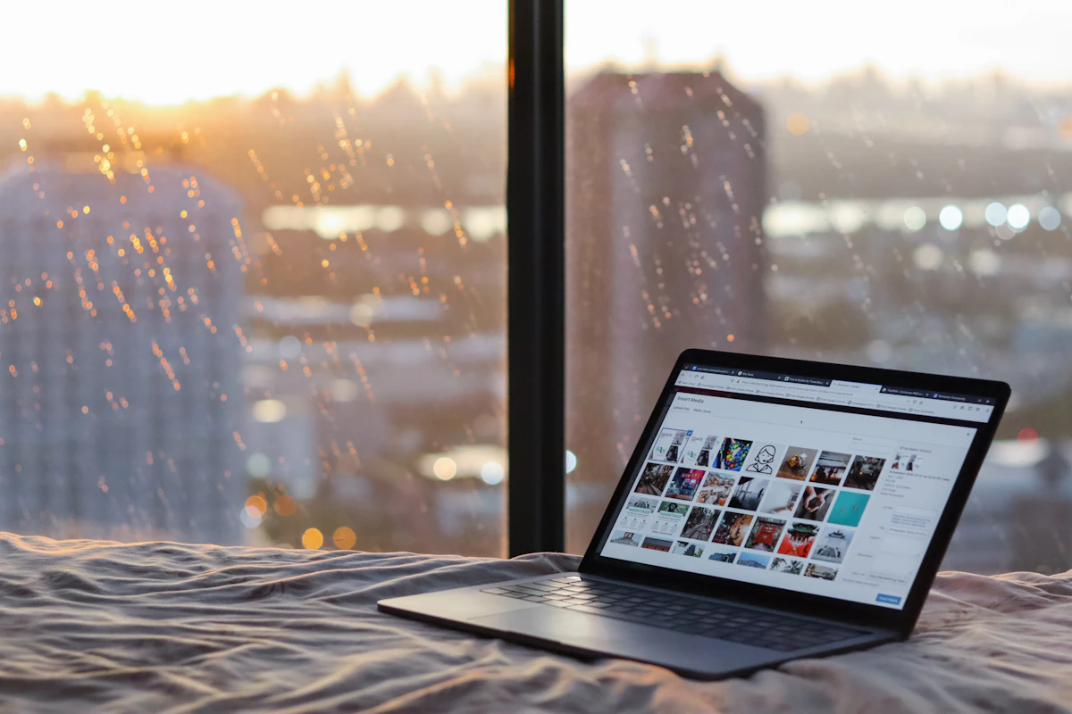 Person booking a hotel on a laptop