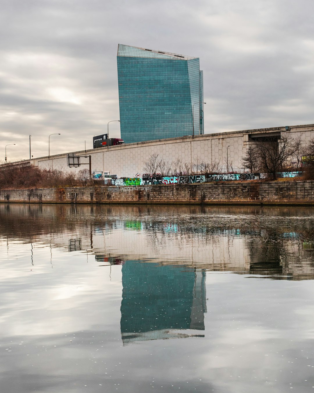 gray building near body of water during daytime