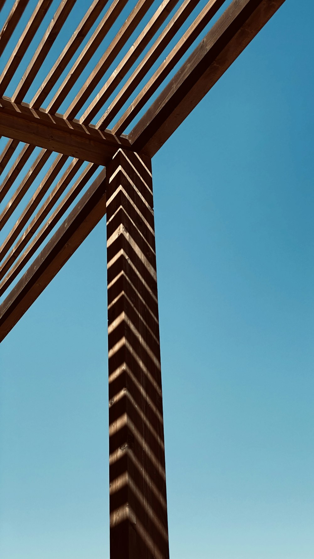 brown wooden frame under blue sky during daytime