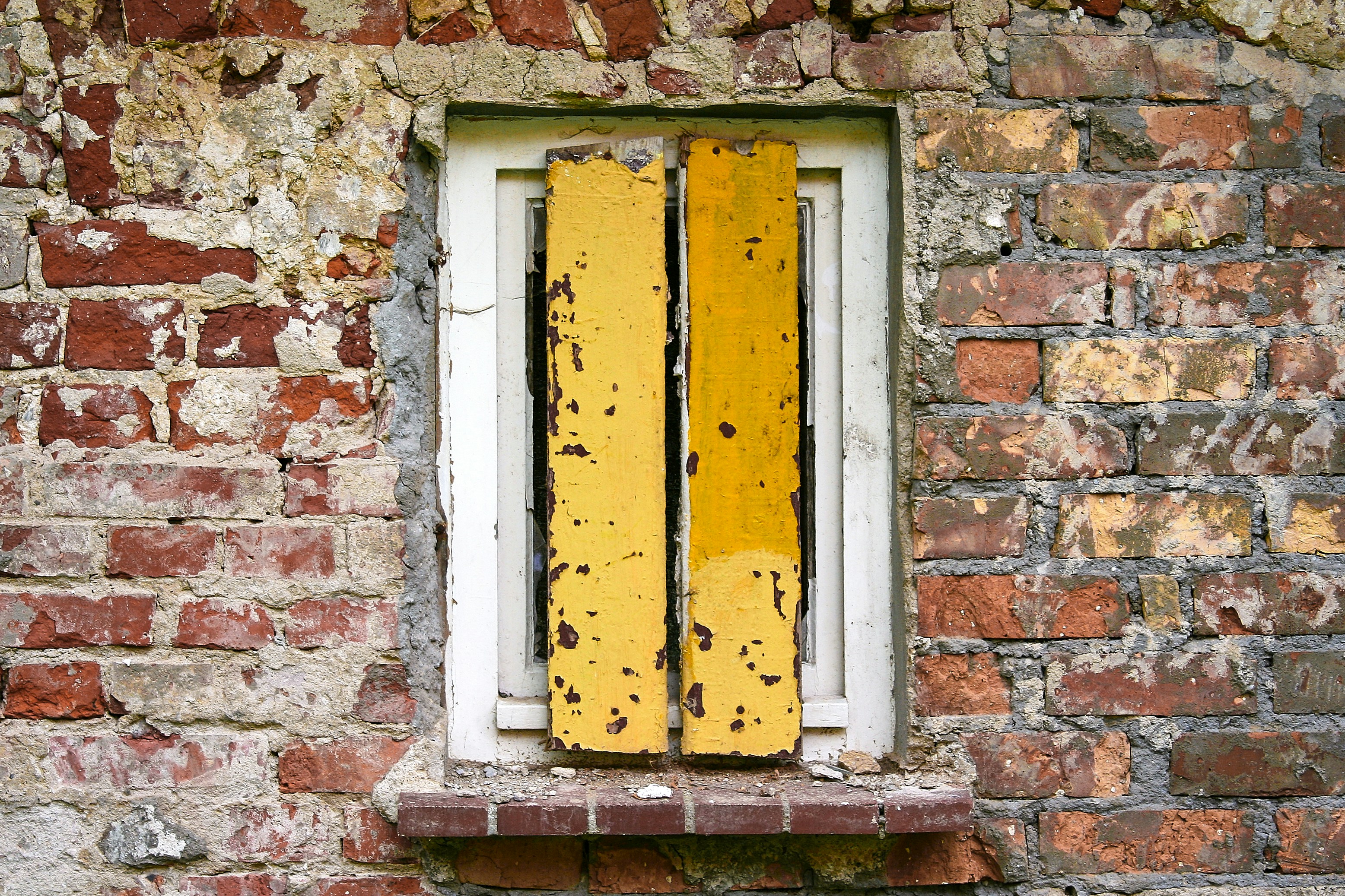 yellow and white wooden window