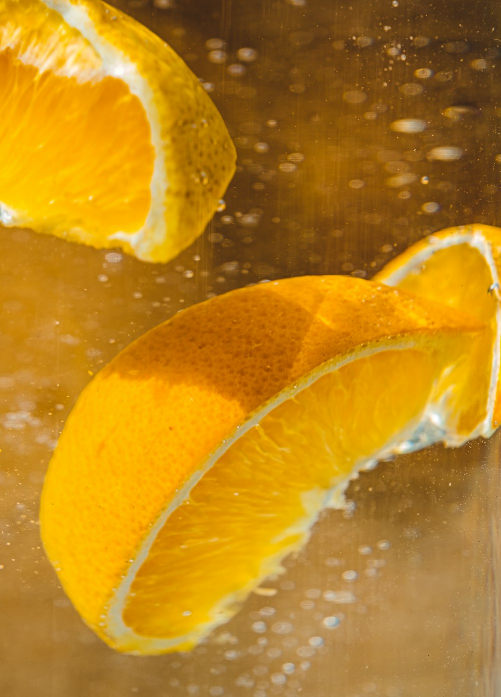 orange fruit on brown wooden table