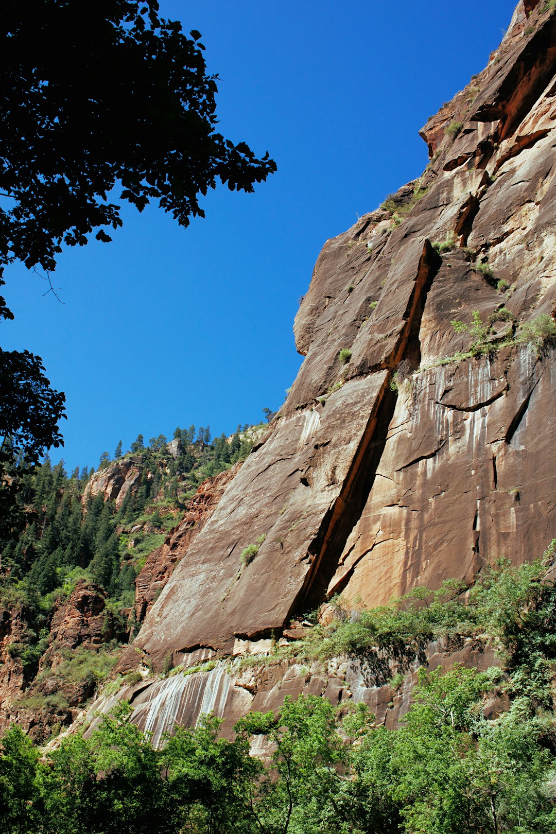 brown rock formation under blue sky during daytime