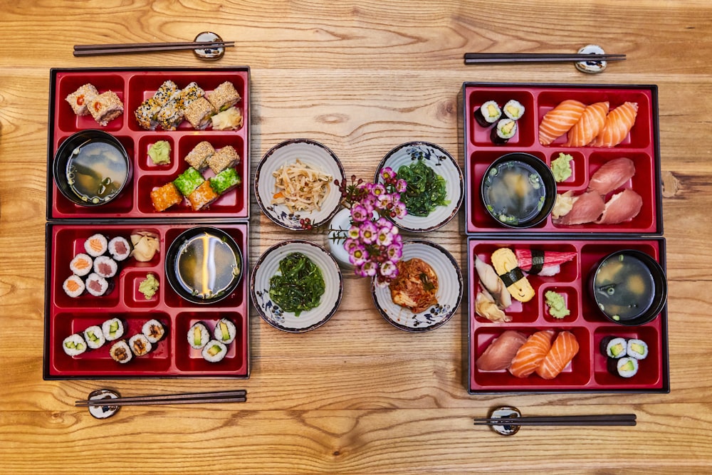 red and green ceramic bowls on brown wooden tray