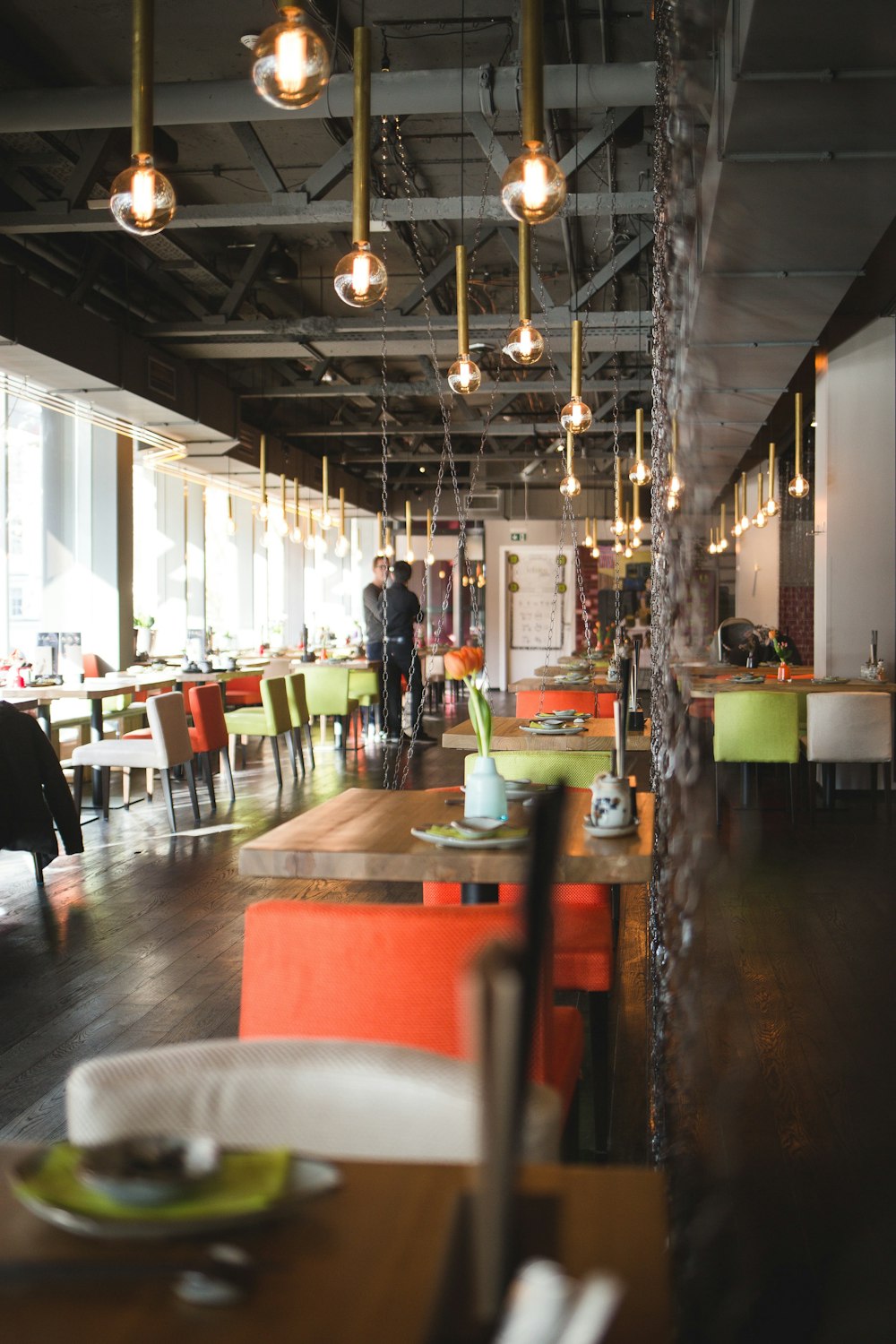 people sitting on chair inside restaurant