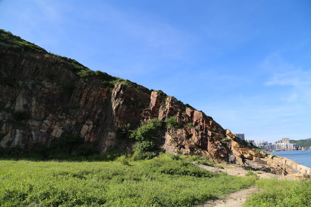 brown rocky mountain under blue sky during daytime