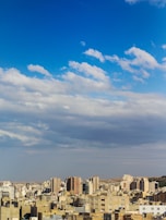 A futuristic cityscape on a distant planet under a sky filled with multiple moons.