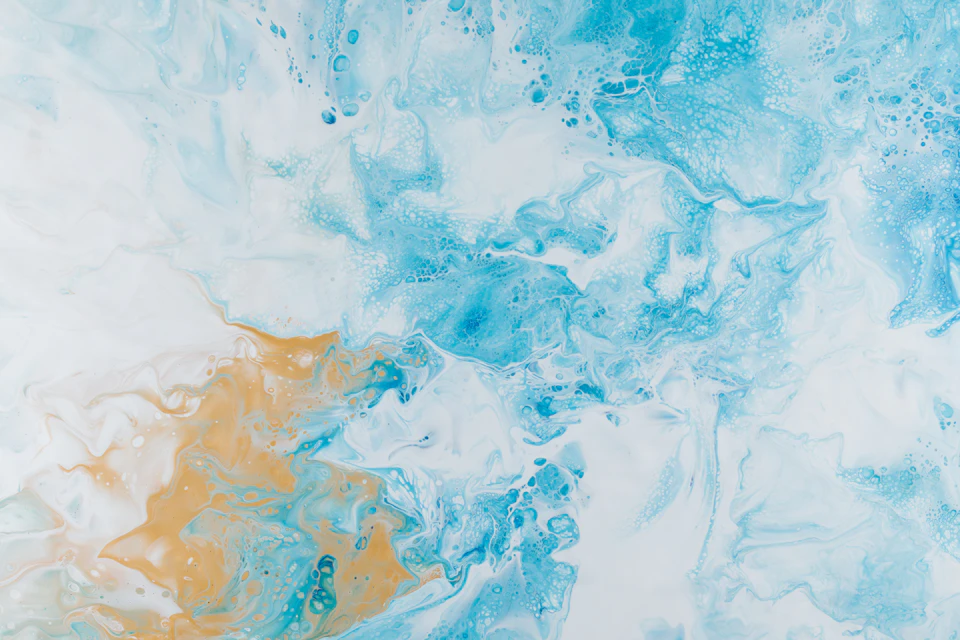Vibrant abstract painting features dominant blues and whites with yellow accents and loose brushstrokes