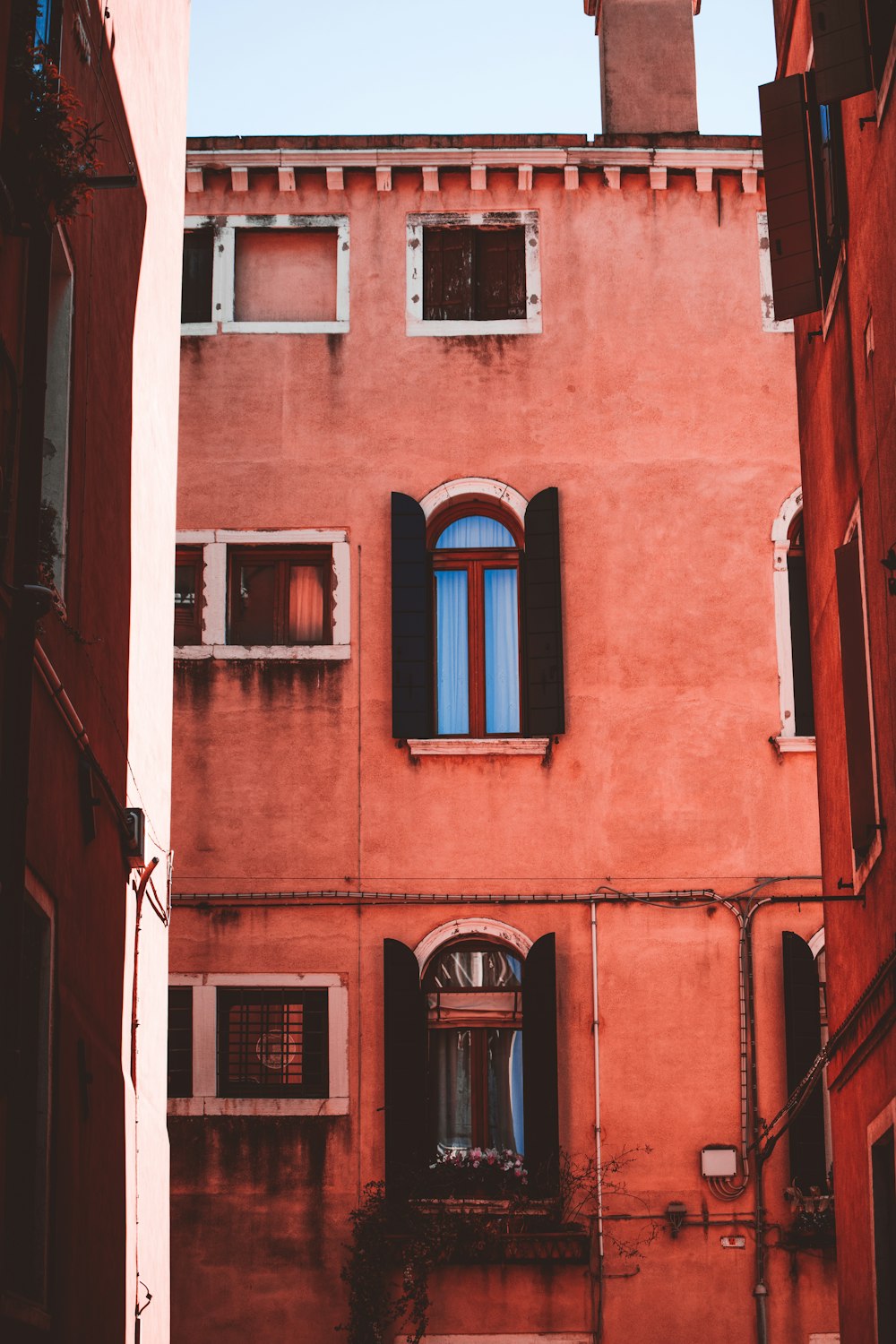 red concrete building during daytime