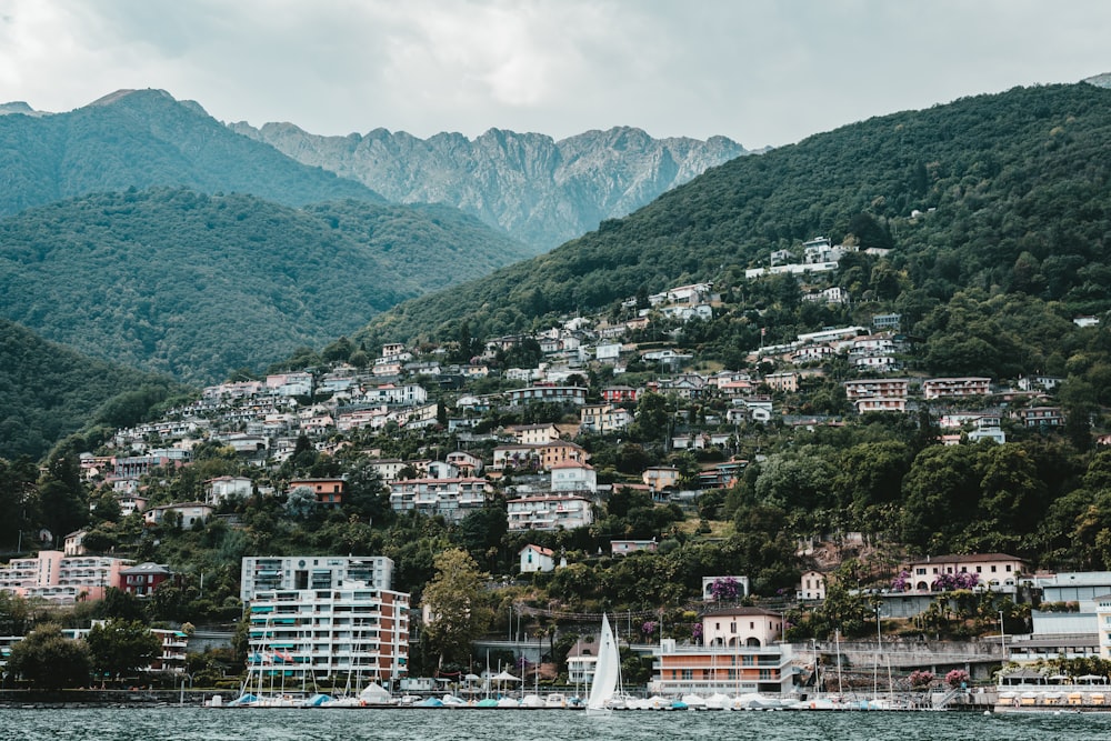 city buildings near mountain during daytime