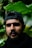 man in black shirt wearing black cap