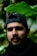 man in black shirt wearing black cap