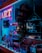 A store display window features various accessories, including purses and handbags, under vibrant blue and pink neon lighting. The interior of the store is dimly lit, highlighting the colorful and artistic presentation of the products.
