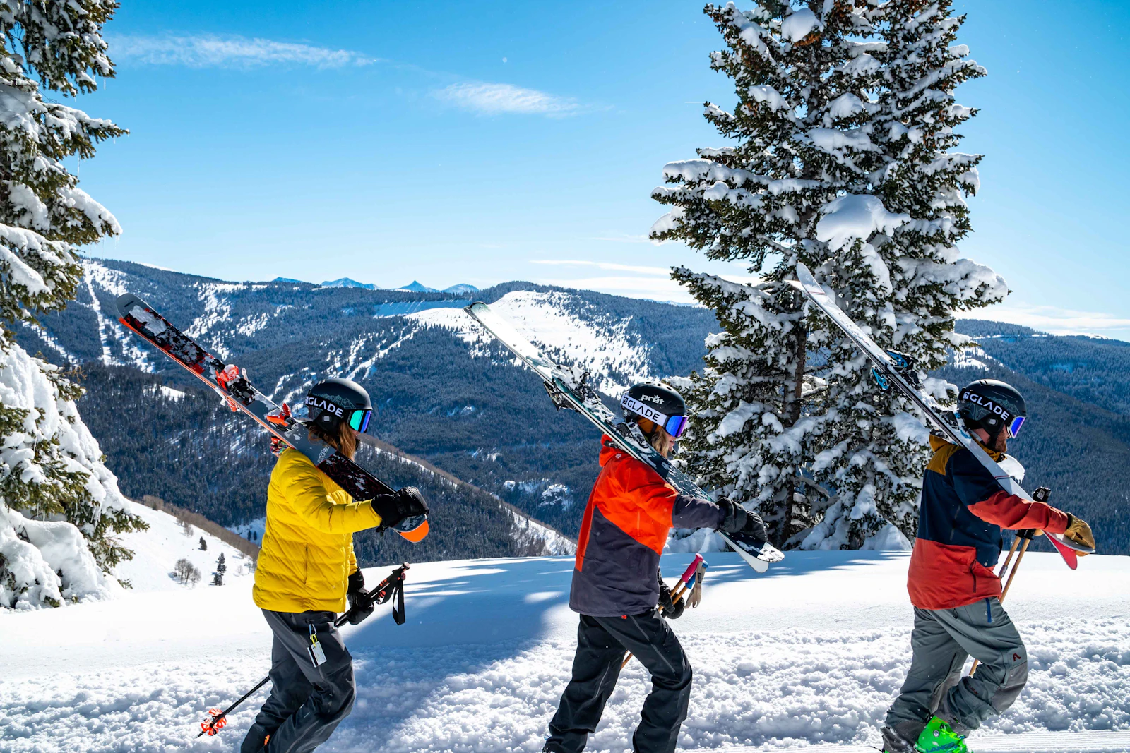 Family skiing together on a snowy slope