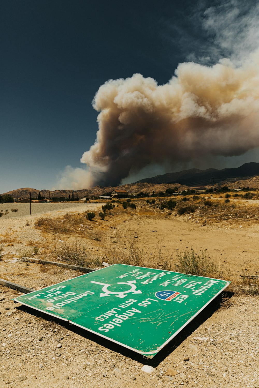 green and white road sign