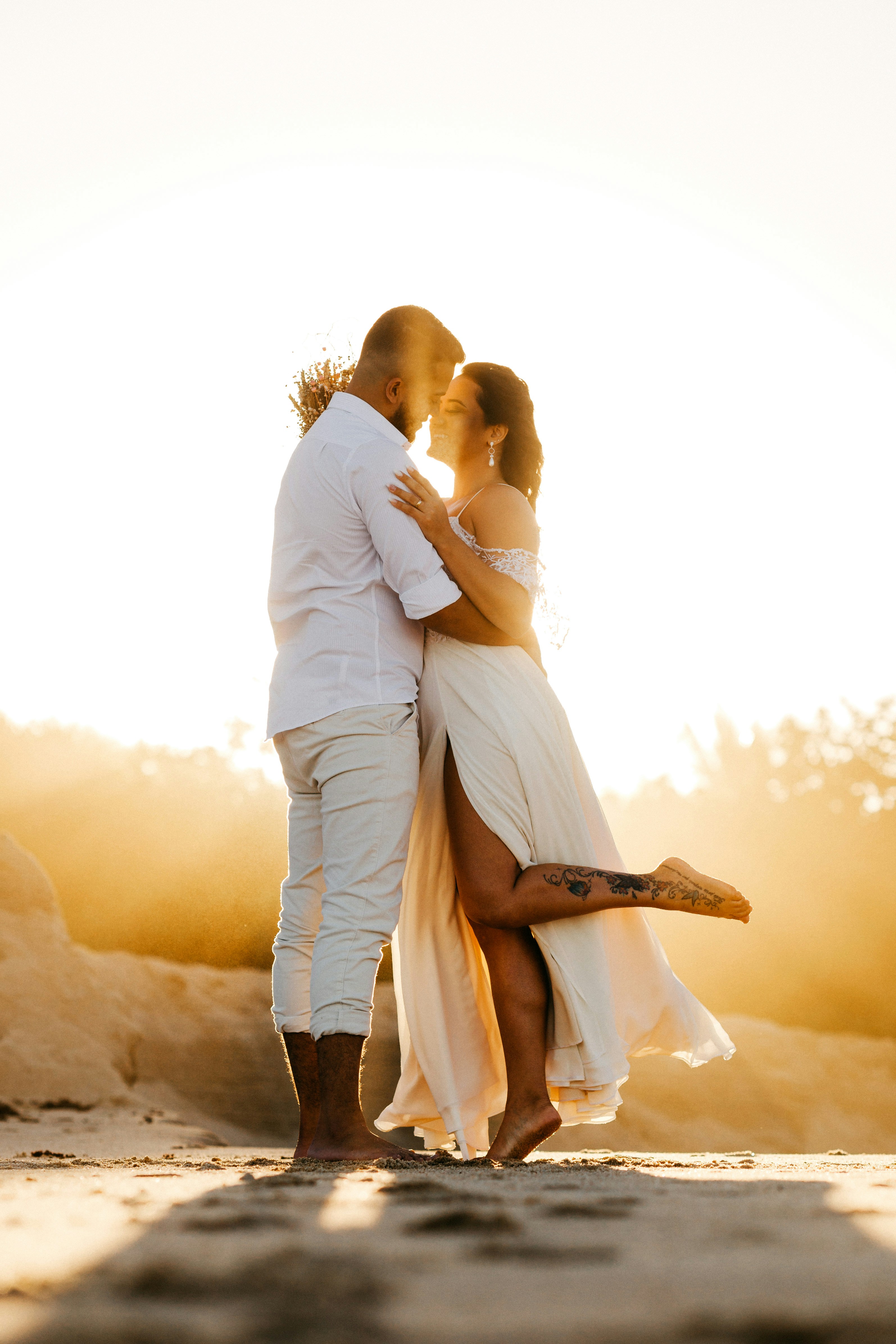Man And Woman Kissing During Sunset Photo Free Human Image On Unsplash