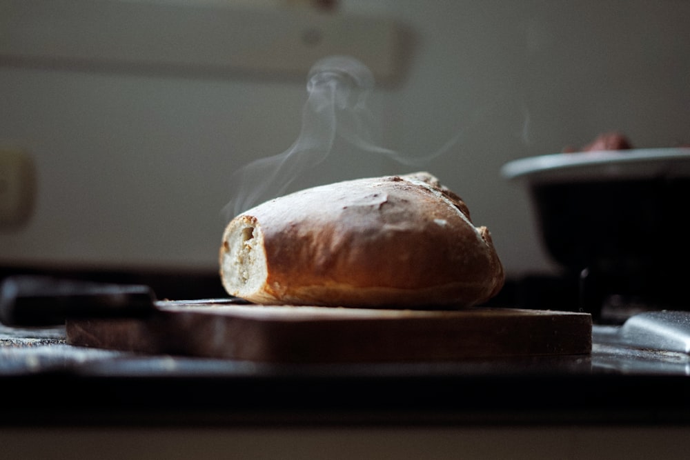 bread on brown wooden tray