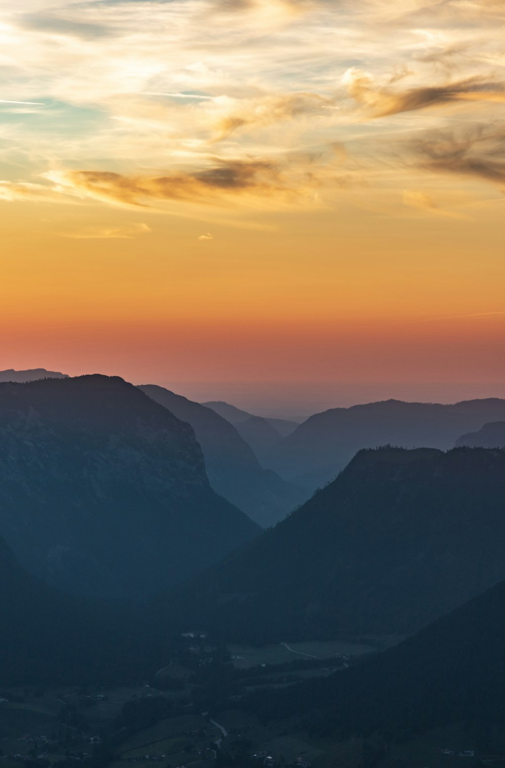 silhouette of mountains during sunset