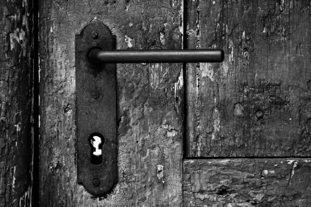 brown wooden door with black and white number 8