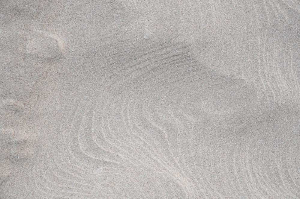 close up photo of gray sand