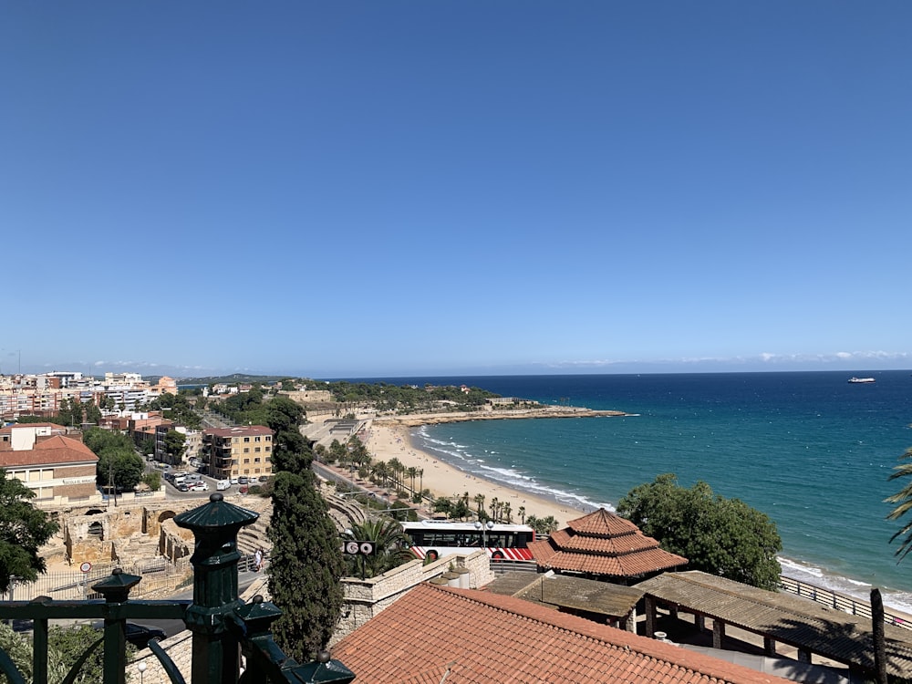 aerial view of city near sea during daytime