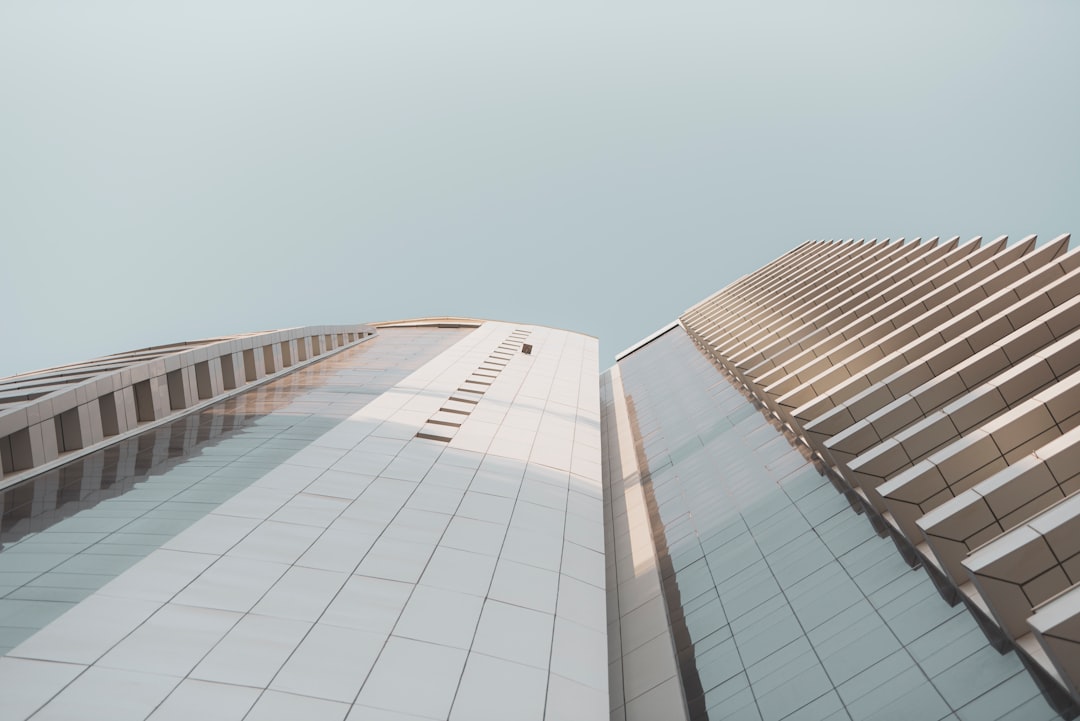 white concrete building under blue sky during daytime