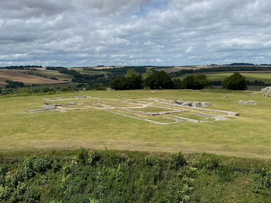 green grass field under white clouds during daytime in Old Sarum United Kingdom